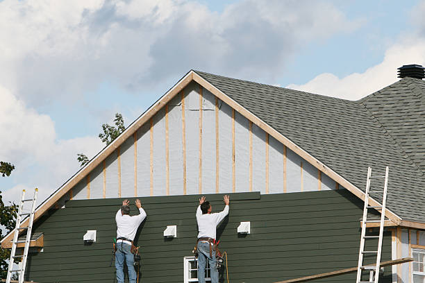 Professional Vinyl Siding technician working in Hesston, PA